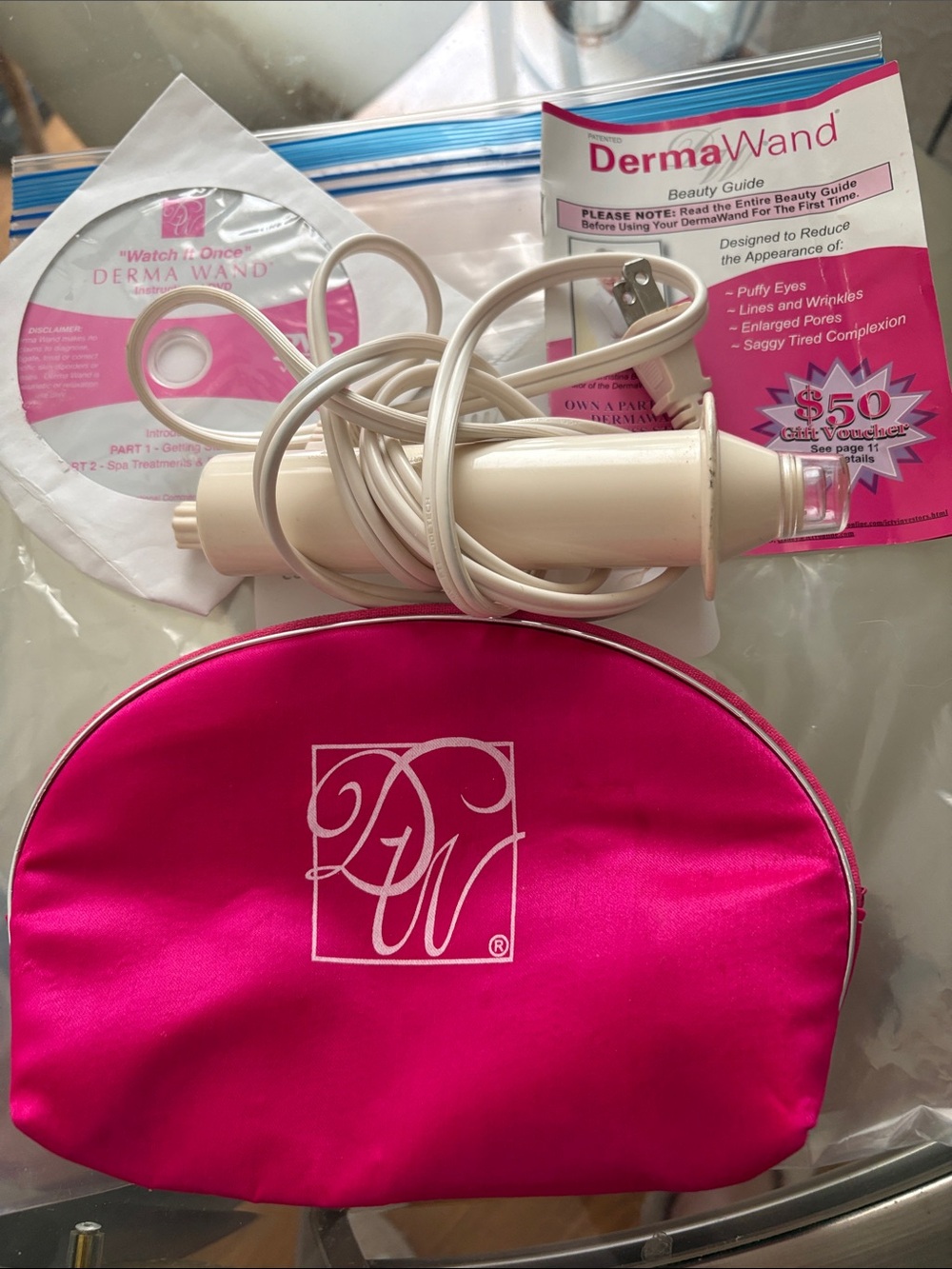 Beauty Device with Hot Pink Carrying Pouch